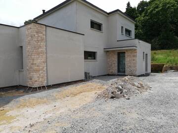 Construction d'une maison en agglos à Henon 